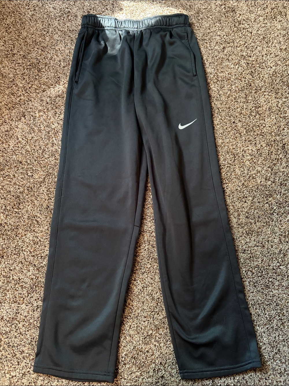 Nike dark gray Sweatpants with White Swoosh